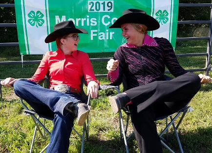 Michelle & Delayna relaxing in their embroidered Chair prizes and enjoying their time at the fair! 